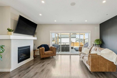 288 Lucas Avenue, Calgary, AB - Indoor Photo Showing Living Room With Fireplace
