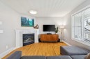 4324 Passchendaele Road Sw, Calgary, AB  - Indoor Photo Showing Living Room With Fireplace 