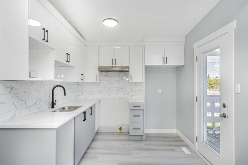 6403 Centre Street Nw, Calgary, AB - Indoor Photo Showing Kitchen With Double Sink
