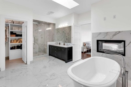 2540 2 Avenue Nw, Calgary, AB - Indoor Photo Showing Bathroom With Fireplace