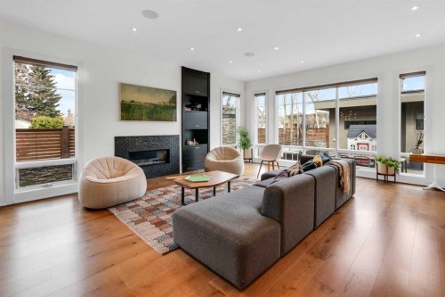 2540 2 Avenue Nw, Calgary, AB - Indoor Photo Showing Living Room With Fireplace