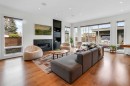 2540 2 Avenue Nw, Calgary, AB  - Indoor Photo Showing Living Room With Fireplace 