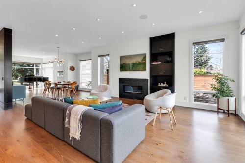 2540 2 Avenue Nw, Calgary, AB - Indoor Photo Showing Living Room With Fireplace