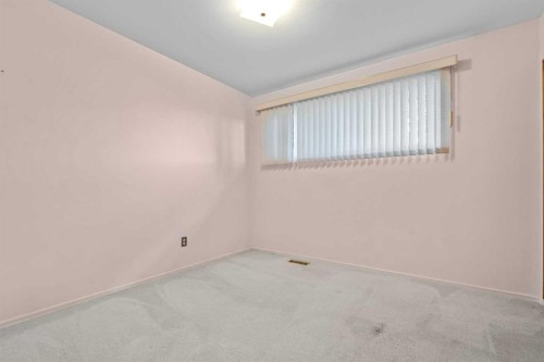 5220 Grove Hill Road Sw, Calgary, AB - Indoor Photo Showing Other Room