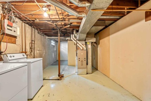 5220 Grove Hill Road Sw, Calgary, AB - Indoor Photo Showing Basement