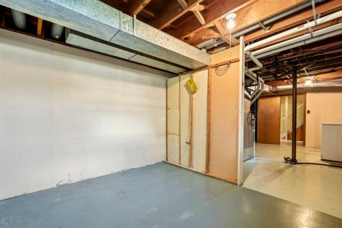 5220 Grove Hill Road Sw, Calgary, AB - Indoor Photo Showing Basement
