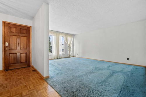5220 Grove Hill Road Sw, Calgary, AB - Indoor Photo Showing Other Room