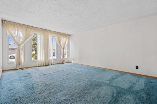 5220 Grove Hill Road Sw, Calgary, AB - Indoor Photo Showing Other Room