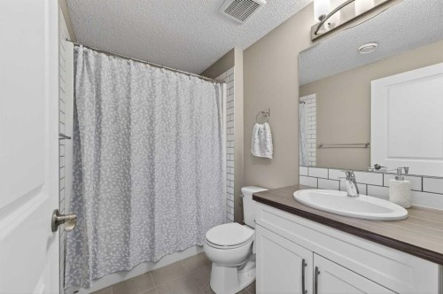 64 Masters Link Se, Calgary, AB - Indoor Photo Showing Bedroom
