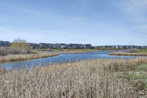 64 Masters Link Se, Calgary, AB - Outdoor With Body Of Water With View