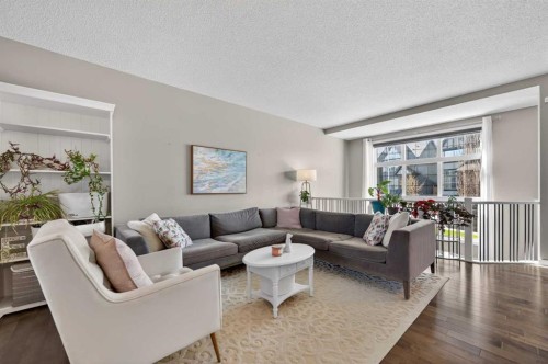 64 Masters Link Se, Calgary, AB - Indoor Photo Showing Living Room