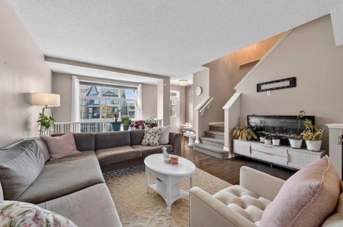 64 Masters Link Se, Calgary, AB - Indoor Photo Showing Living Room