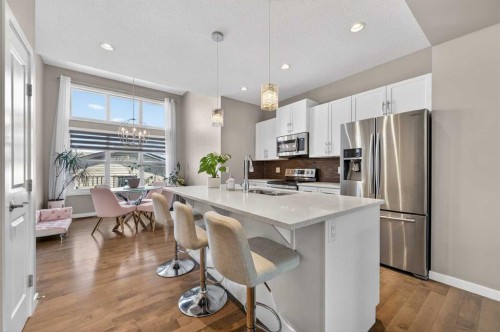 64 Masters Link Se, Calgary, AB - Indoor Photo Showing Kitchen With Stainless Steel Kitchen With Upgraded Kitchen