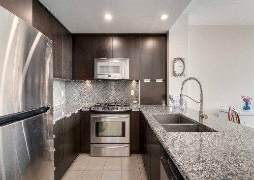 1104-99 Spruce Place Sw, Calgary, AB - Indoor Photo Showing Kitchen With Double Sink With Upgraded Kitchen