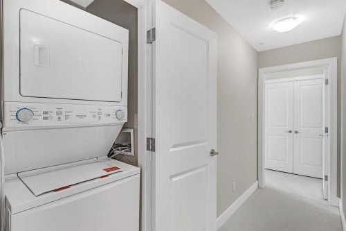 1104-99 Spruce Place Sw, Calgary, AB - Indoor Photo Showing Laundry Room