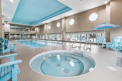 1104-99 Spruce Place Sw, Calgary, AB - Indoor Photo Showing Other Room With In Ground Pool