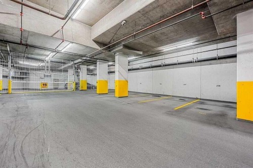 1104-99 Spruce Place Sw, Calgary, AB - Indoor Photo Showing Garage