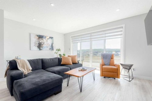 99 Haskayne Drive Nw, Calgary, AB - Indoor Photo Showing Living Room