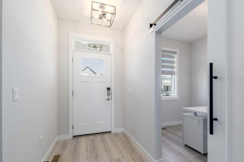 99 Haskayne Drive Nw, Calgary, AB - Indoor Photo Showing Other Room