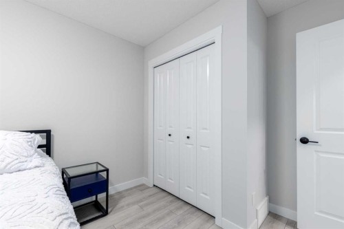 99 Haskayne Drive Nw, Calgary, AB - Indoor Photo Showing Bedroom
