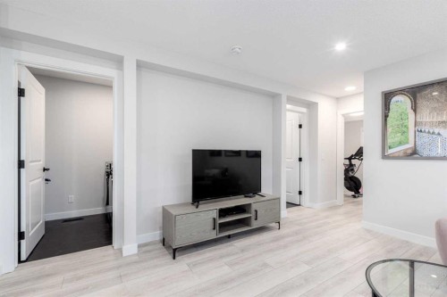 99 Haskayne Drive Nw, Calgary, AB - Indoor Photo Showing Living Room