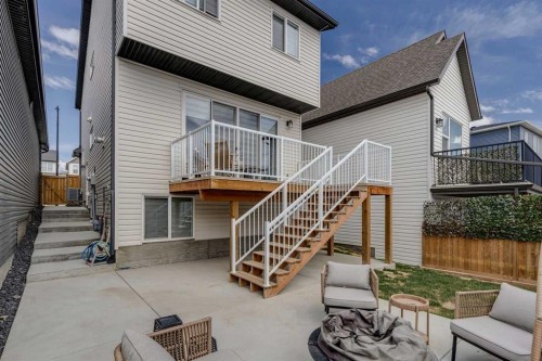 99 Haskayne Drive Nw, Calgary, AB - Outdoor With Deck Patio Veranda With Exterior