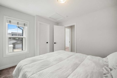 851 Seton Circle Se, Calgary, AB - Indoor Photo Showing Bedroom