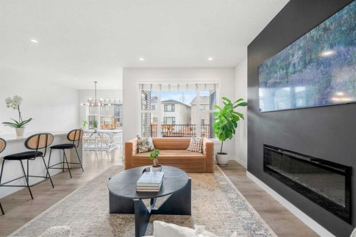 851 Seton Circle Se, Calgary, AB - Indoor Photo Showing Living Room With Fireplace