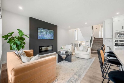851 Seton Circle Se, Calgary, AB - Indoor Photo Showing Living Room With Fireplace