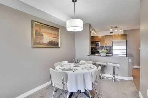 414-7210 80 Avenue Ne, Calgary, AB - Indoor Photo Showing Dining Room