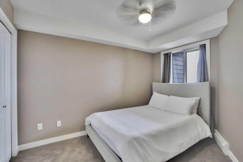 414-7210 80 Avenue Ne, Calgary, AB - Indoor Photo Showing Bedroom