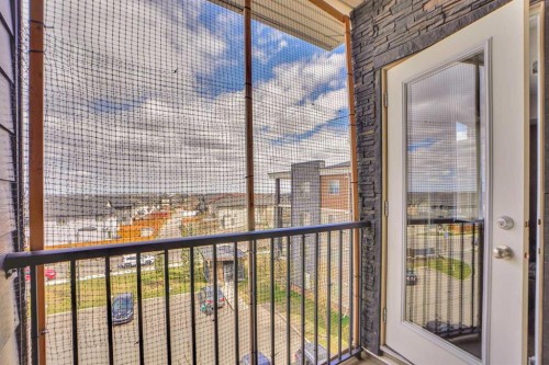414-7210 80 Avenue Ne, Calgary, AB - Indoor Photo Showing Other Room