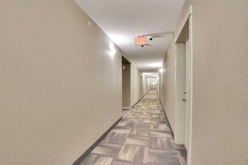 414-7210 80 Avenue Ne, Calgary, AB - Indoor Photo Showing Other Room
