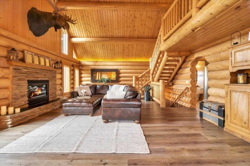2 Wheatland Green, Strathmore, AB - Indoor Photo Showing Living Room With Fireplace