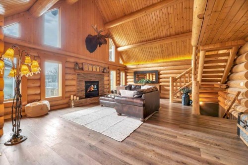 2 Wheatland Green, Strathmore, AB - Indoor Photo Showing Living Room With Fireplace