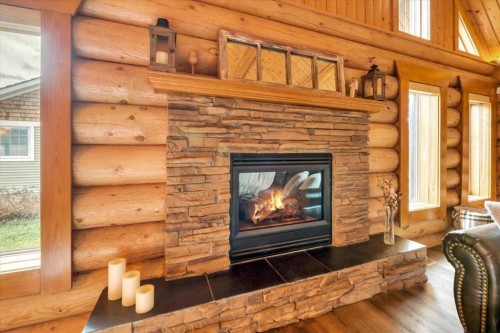 2 Wheatland Green, Strathmore, AB - Indoor Photo Showing Living Room With Fireplace