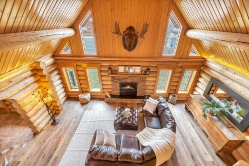 2 Wheatland Green, Strathmore, AB - Indoor Photo Showing Living Room With Fireplace