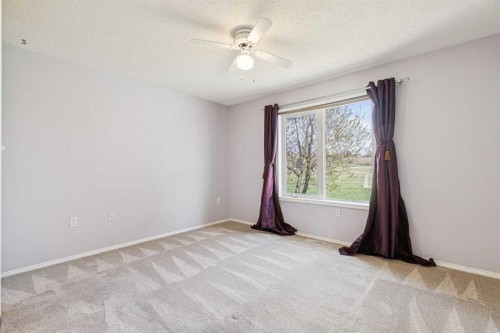 34-105 Elm Place, Okotoks, AB - Indoor Photo Showing Other Room