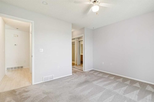 34-105 Elm Place, Okotoks, AB - Indoor Photo Showing Other Room