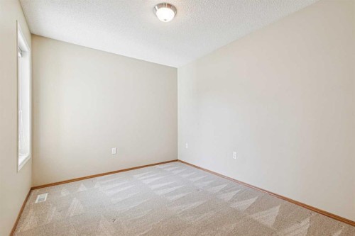 34-105 Elm Place, Okotoks, AB - Indoor Photo Showing Other Room