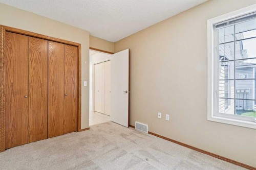 34-105 Elm Place, Okotoks, AB - Indoor Photo Showing Other Room