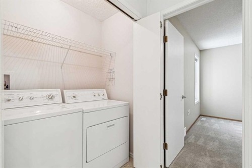 34-105 Elm Place, Okotoks, AB - Indoor Photo Showing Laundry Room