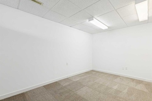 34-105 Elm Place, Okotoks, AB - Indoor Photo Showing Other Room