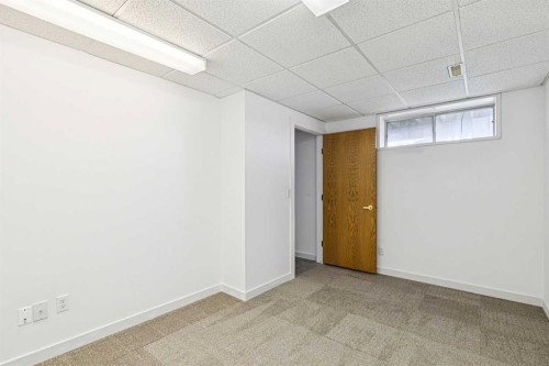 34-105 Elm Place, Okotoks, AB - Indoor Photo Showing Other Room