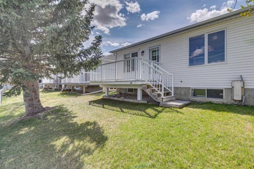 34-105 Elm Place, Okotoks, AB - Outdoor With Deck Patio Veranda