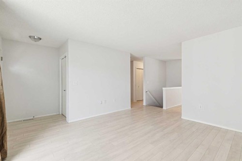 34-105 Elm Place, Okotoks, AB - Indoor Photo Showing Other Room