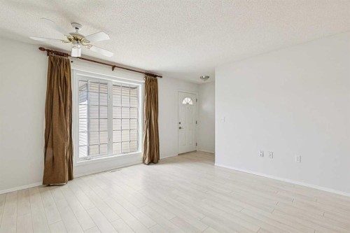 34-105 Elm Place, Okotoks, AB - Indoor Photo Showing Other Room
