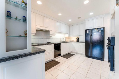 8 Prominence Path Sw, Calgary, AB - Indoor Photo Showing Kitchen