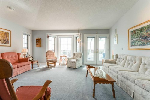 8 Prominence Path Sw, Calgary, AB - Indoor Photo Showing Living Room