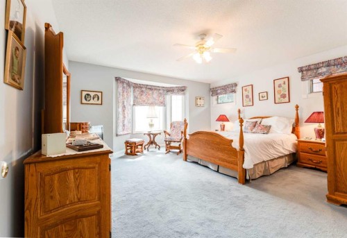 8 Prominence Path Sw, Calgary, AB - Indoor Photo Showing Bedroom